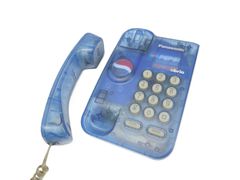 Проводной телефон PEPSI Panasonic KX-TS3MXF Особенности корпуса: Выполнен в стиле компании PEPSI, в прозрачном корпусе.