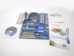 Материнская плата Socket 1156 Gigabyte GA-P55-UD3 <br />Имеется небольшой дефект разъема PS/2 (На работоспособность подключаемых устройств не влияет)